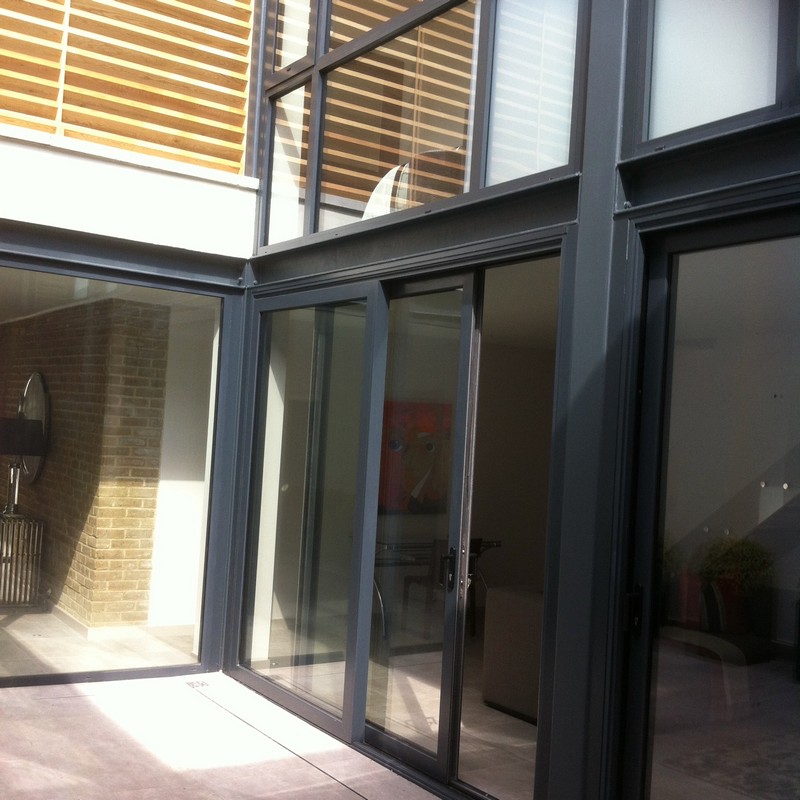 Anthracite aluminium sliding patio doors fitted in East Finchley