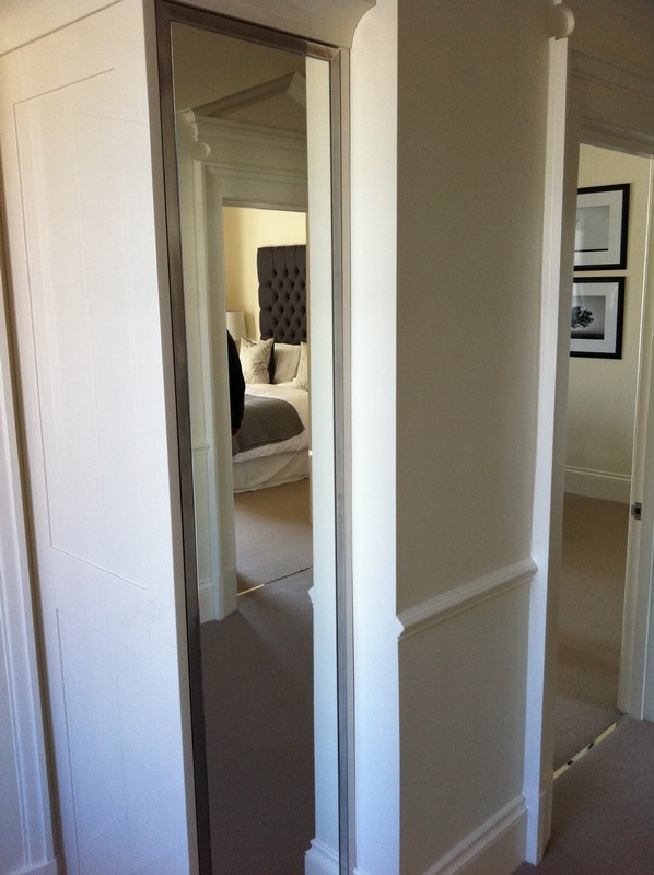 Full-length wardrobe mirror fitted in East Finchley home