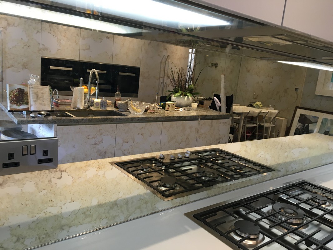 Mirror glass splashback in East Finchley luxury kitchen