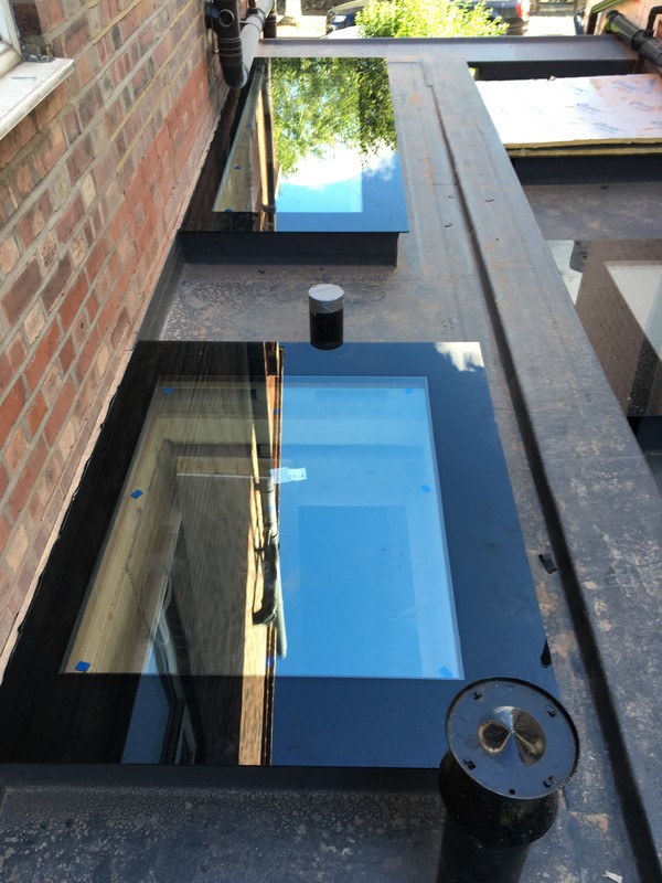 Multiple flat roof skylights on extension in East Finchley